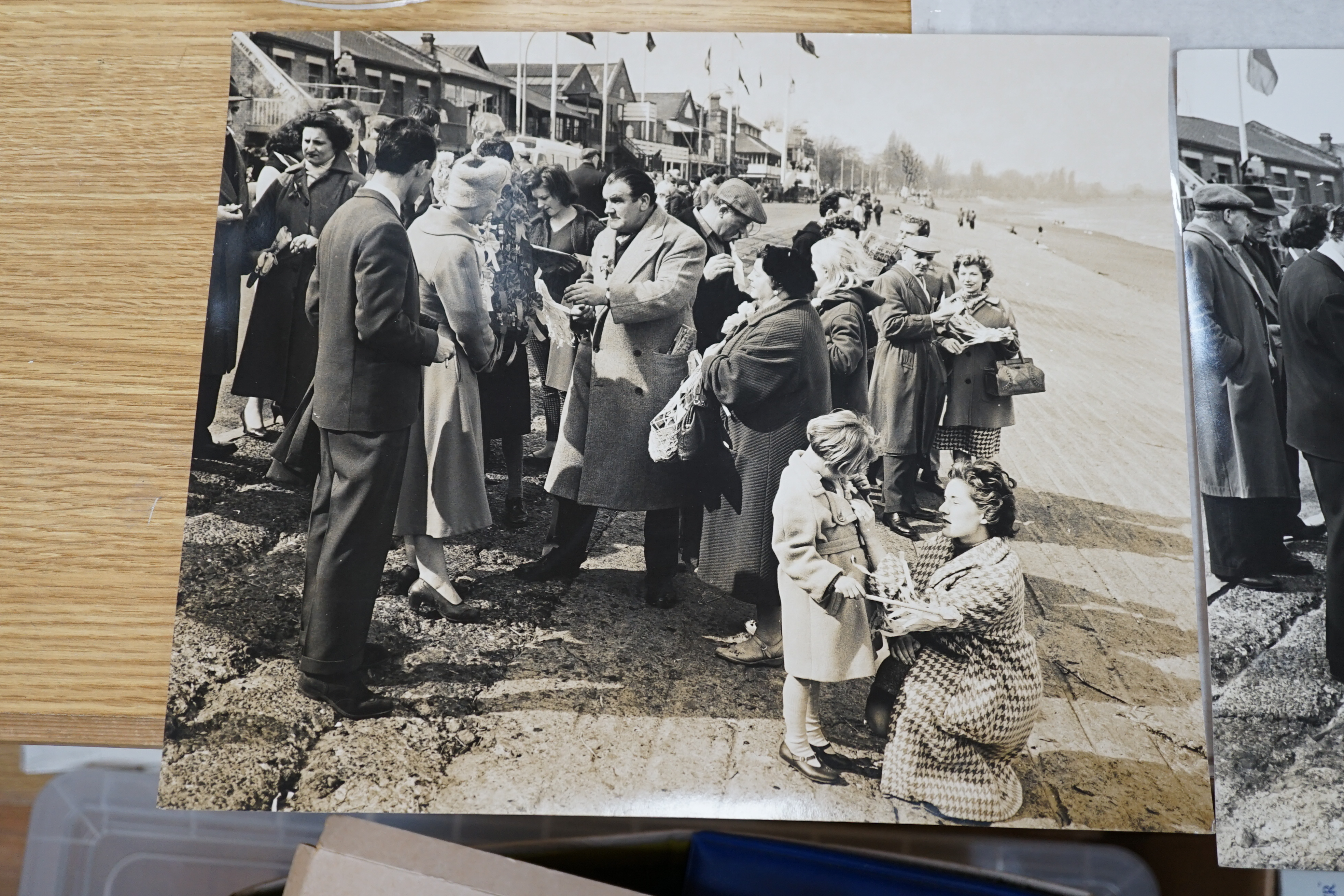 Bert Hardy, two black and white photographs, Coastal views with figures, one stamped verso, largest 28 x 34cm, unframed. Condition - fair to good